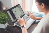 typing on laptop